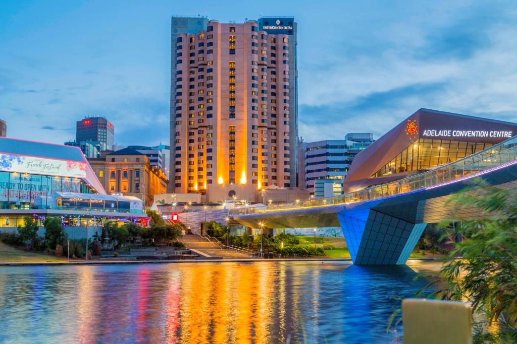 a city with a bridge over a body of water at InterContinental Adelaide, an IHG Hotel in Adelaide