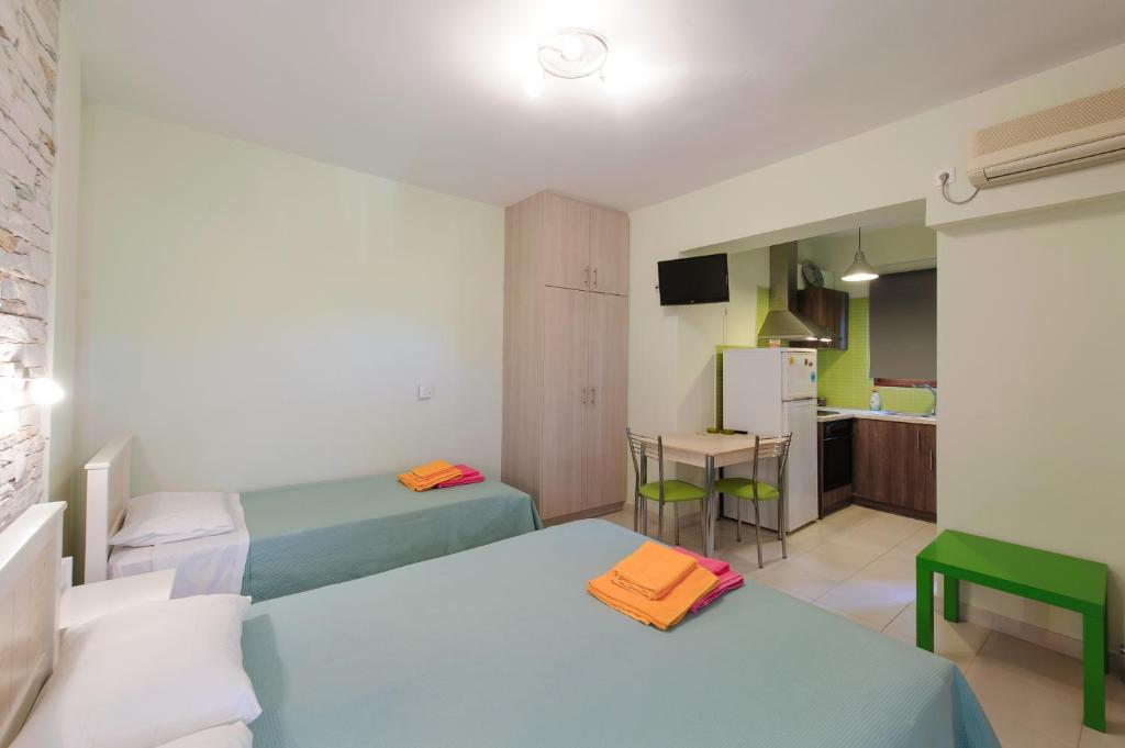 Postel nebo postele na pokoji v ubytování Holiday Rooms