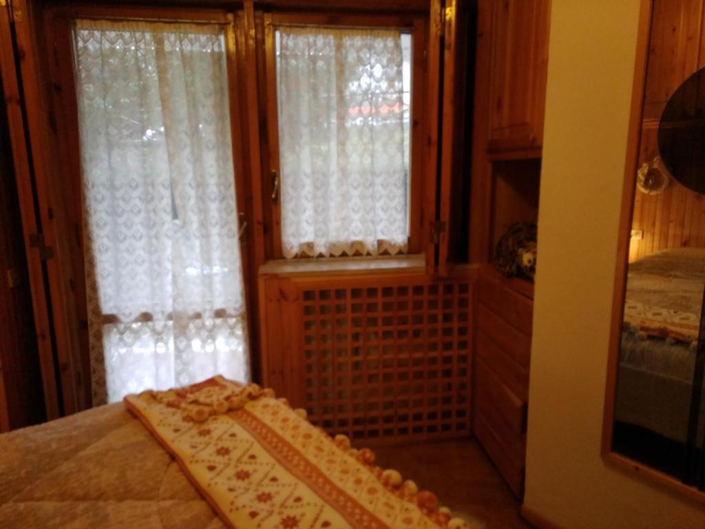 A bed or beds in a room at Pescocostanzo Centro