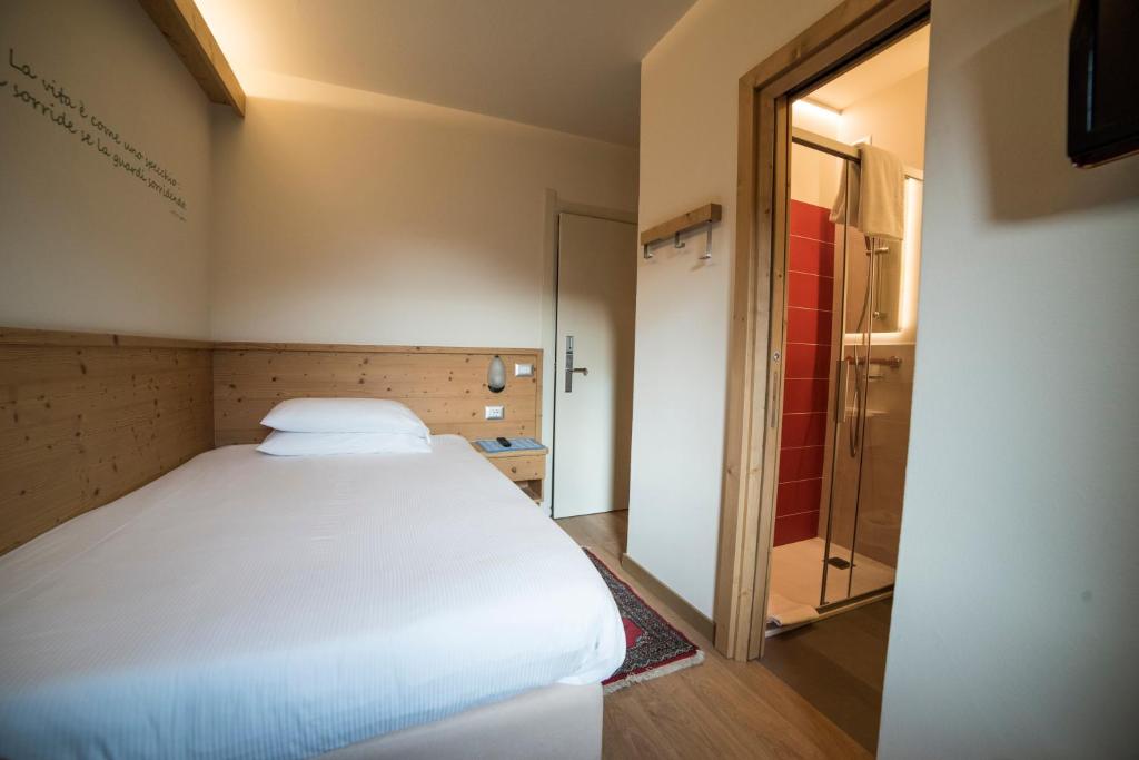 Postel nebo postele na pokoji v ubytování Hotel Terme