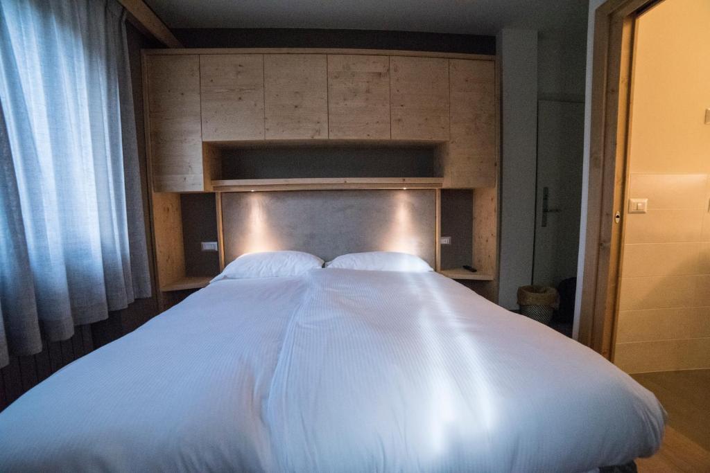 Postel nebo postele na pokoji v ubytování Hotel Terme