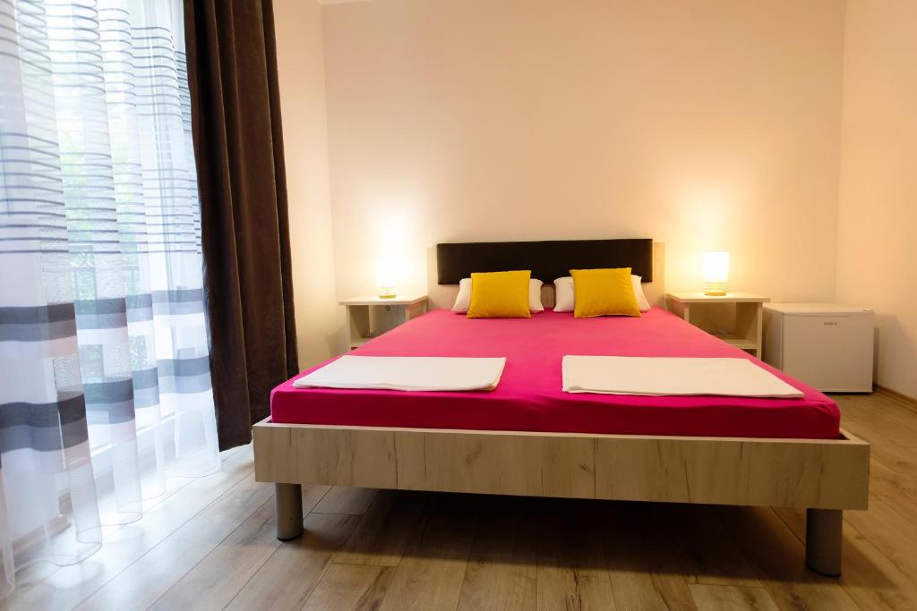 Postel nebo postele na pokoji v ubytování Villa Odobasic Rooms