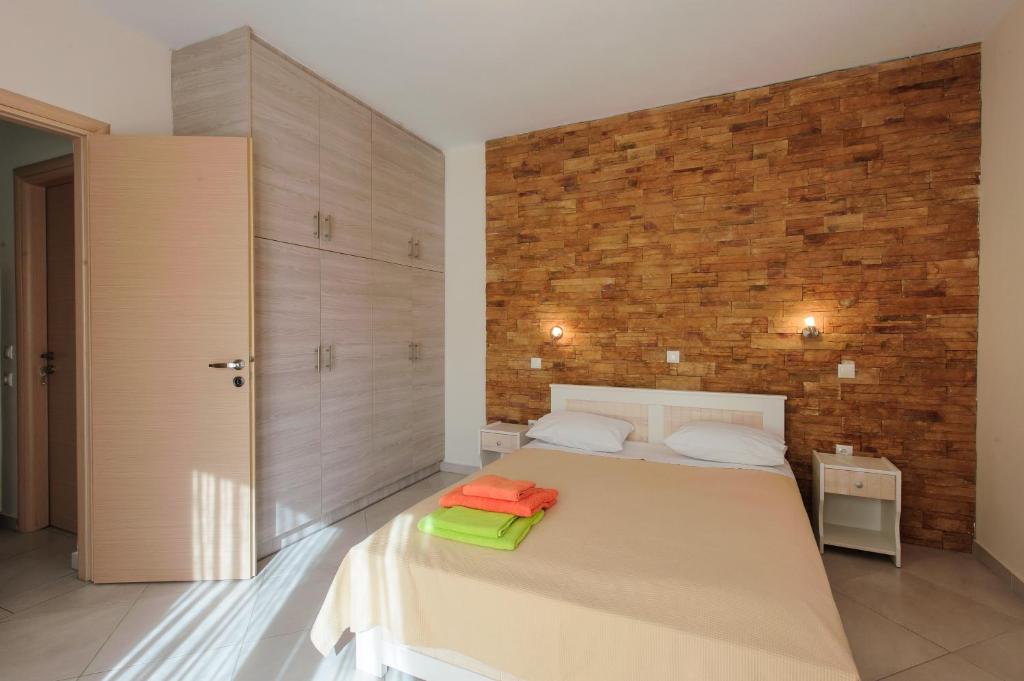 Postel nebo postele na pokoji v ubytování Holiday Rooms