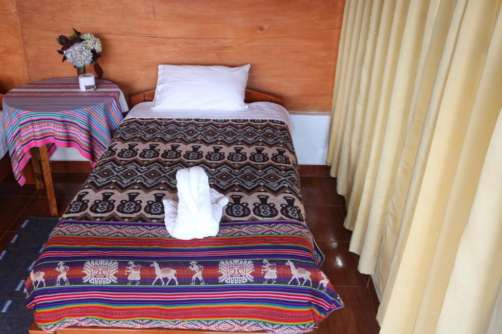 Postel nebo postele na pokoji v ubytování Llactapata Lodge overlooking Machu Picchu - camping - restaurant