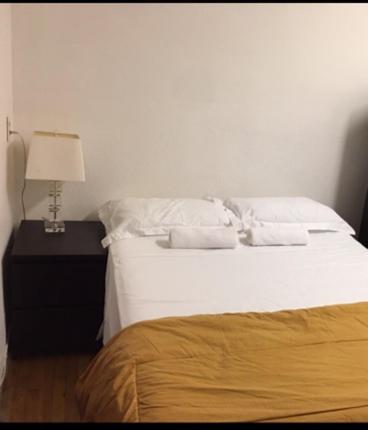 Postel nebo postele na pokoji v ubytování Hotel Mini Inc