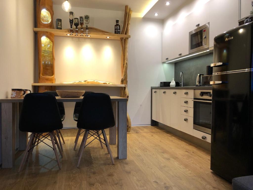 Kuchyň nebo kuchyňský kout v ubytování Apartmán Jestřáb č.15