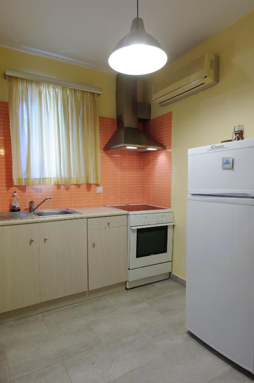 Kuchyň nebo kuchyňský kout v ubytování Holiday Rooms