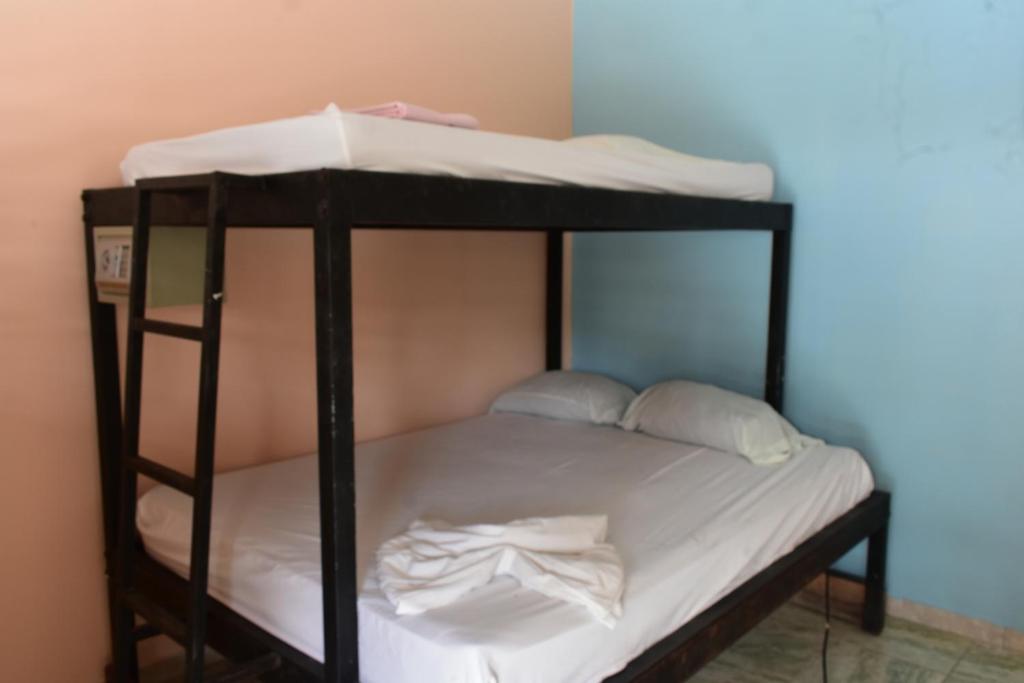 Postel nebo postele na pokoji v ubytování Costa Linda Art Hostel