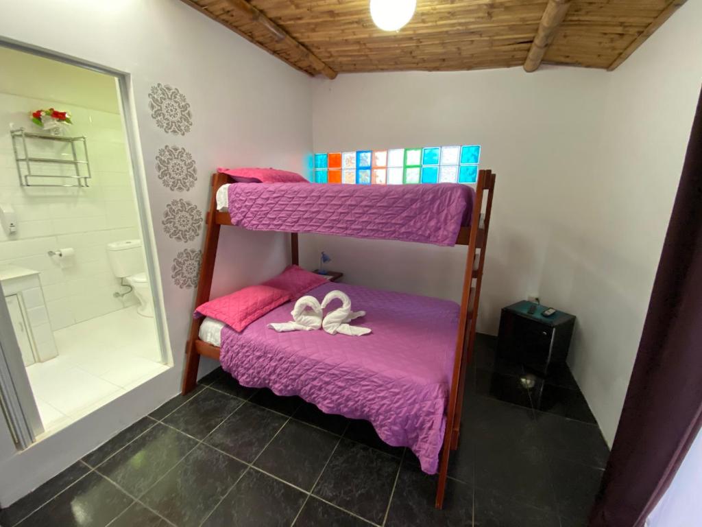 Postel nebo postele na pokoji v ubytování Zurisadai