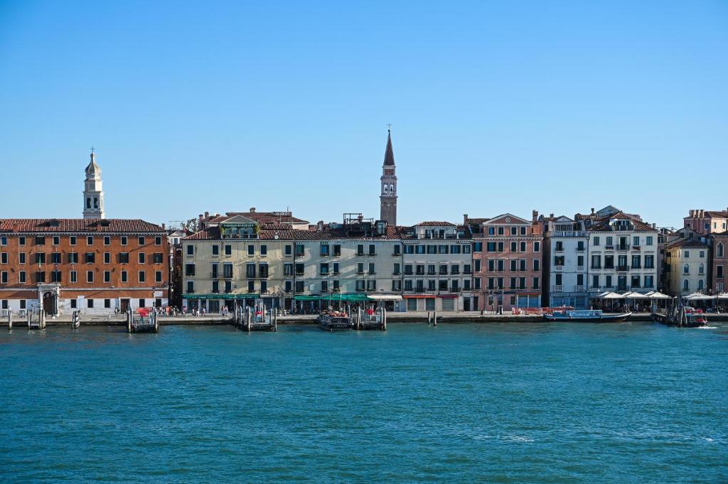 a large body of water with buildings and a city at A Tribute To Music Residenza in Venice