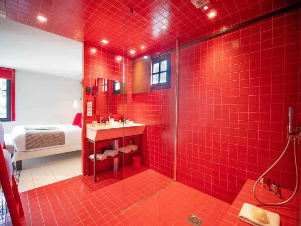 Postel nebo postele na pokoji v ubytování Hotel Pont Levis - Franck Putelat