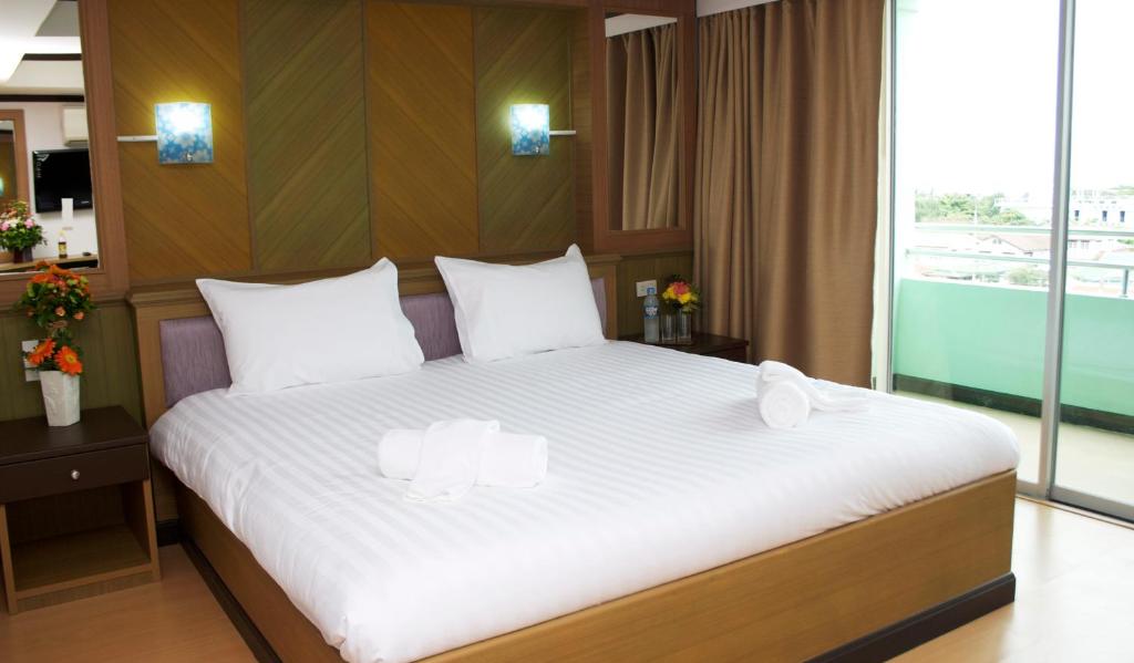 Postel nebo postele na pokoji v ubytování Cordial serviced apartment