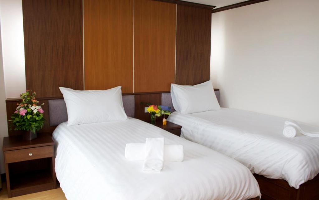 Postel nebo postele na pokoji v ubytování Cordial serviced apartment