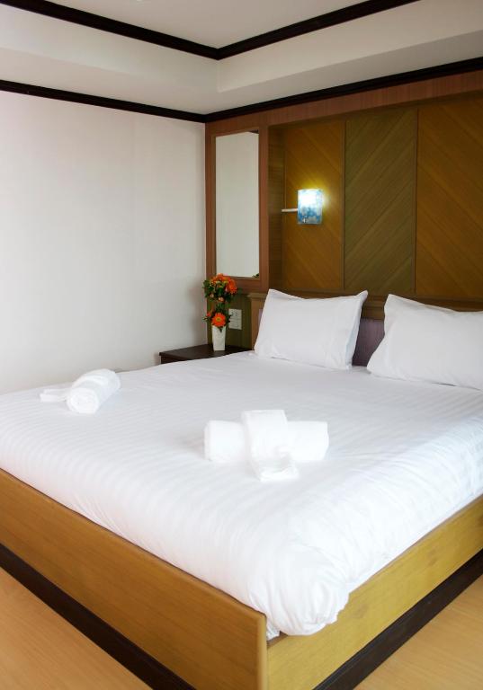 Postel nebo postele na pokoji v ubytování Cordial serviced apartment