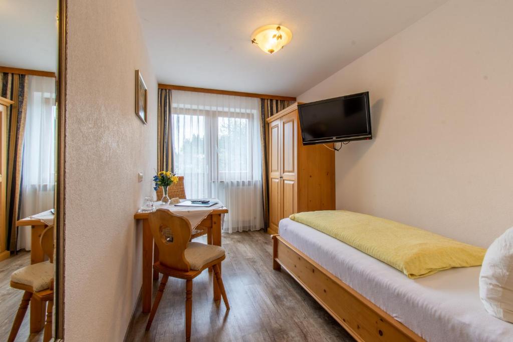 Postel nebo postele na pokoji v ubytování Pension Noella