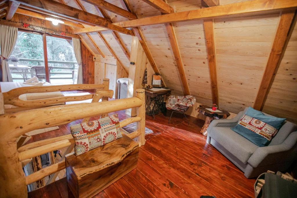 Posezení v ubytování Bistrica Cottage