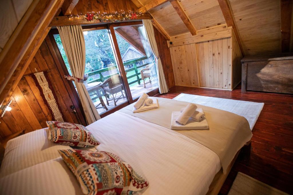Postel nebo postele na pokoji v ubytování Bistrica Cottage