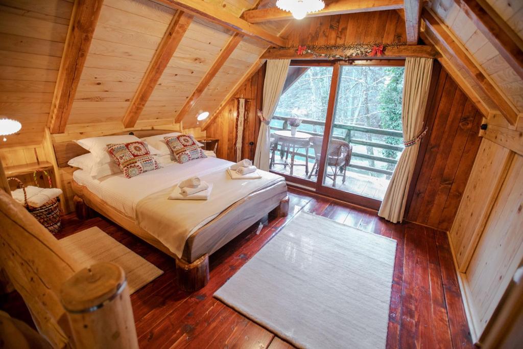 Postel nebo postele na pokoji v ubytování Bistrica Cottage