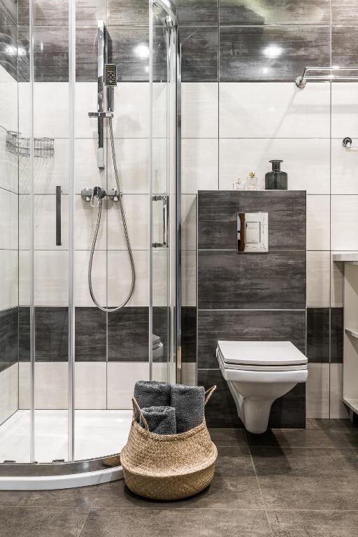 Kúpeľňa v ubytovaní Apartamenty pod Orłem - Rezydencja do Skoczni