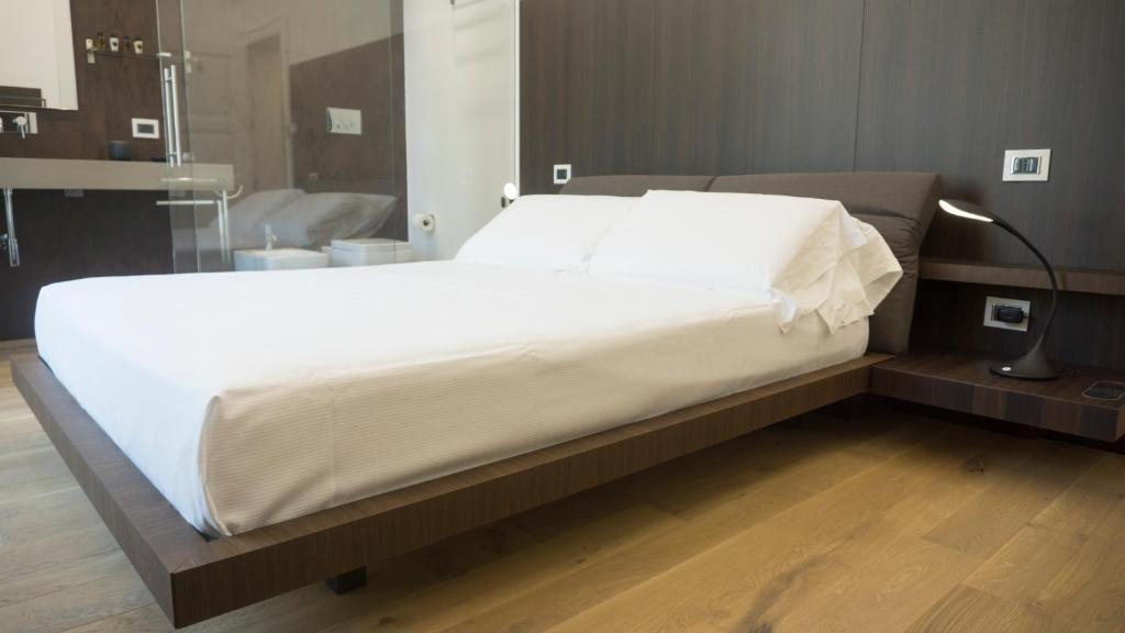 Postel nebo postele na pokoji v ubytování P4 Ortigia_Siracusa