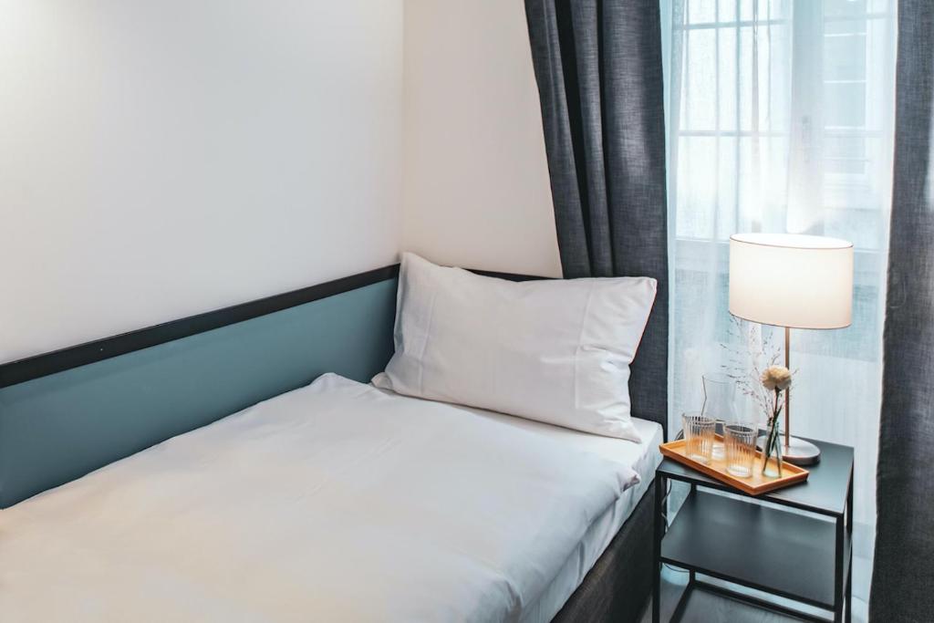 Ein Bett oder Betten in einem Zimmer der Unterkunft Pop Up Hotel Krone Zürich