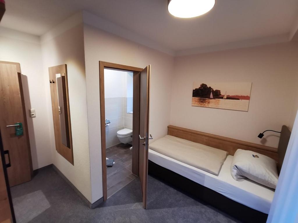 Postel nebo postele na pokoji v ubytování Haus Waldesruh