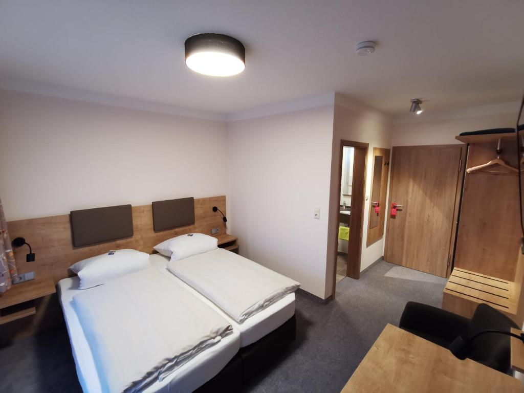 Postel nebo postele na pokoji v ubytování Haus Waldesruh