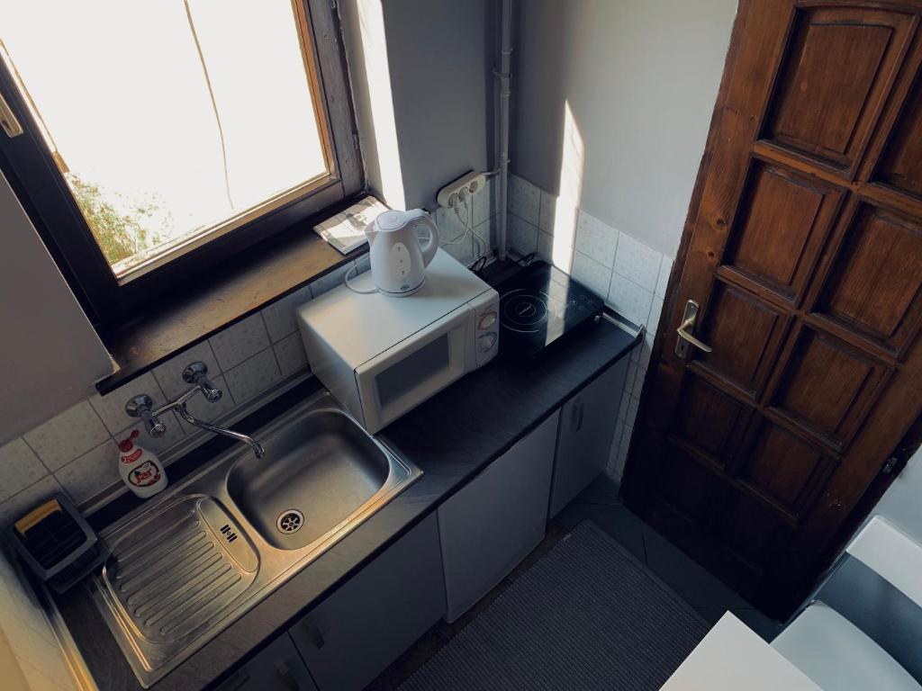 Kuchyň nebo kuchyňský kout v ubytování Vár-Lak Apartman
