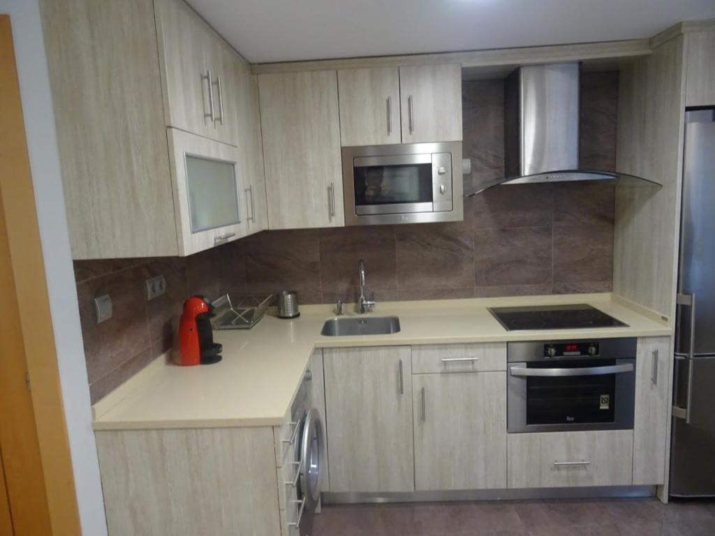 Kuchyň nebo kuchyňský kout v ubytování Lamerako Etxie - La Casa del Parque - Park s Home