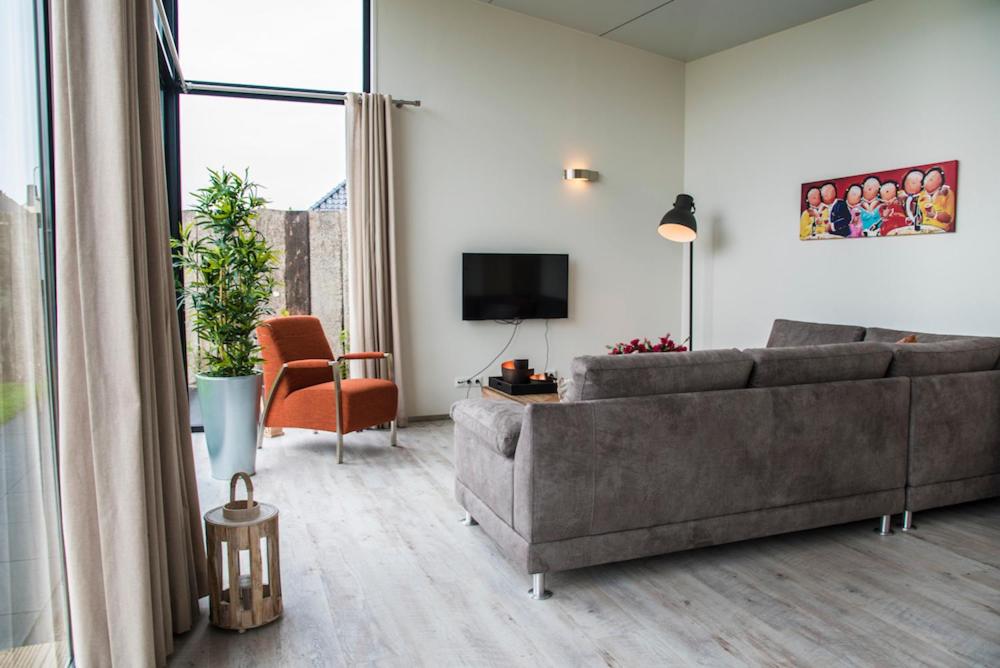 TV a/nebo společenská místnost v ubytování Beach Lodge