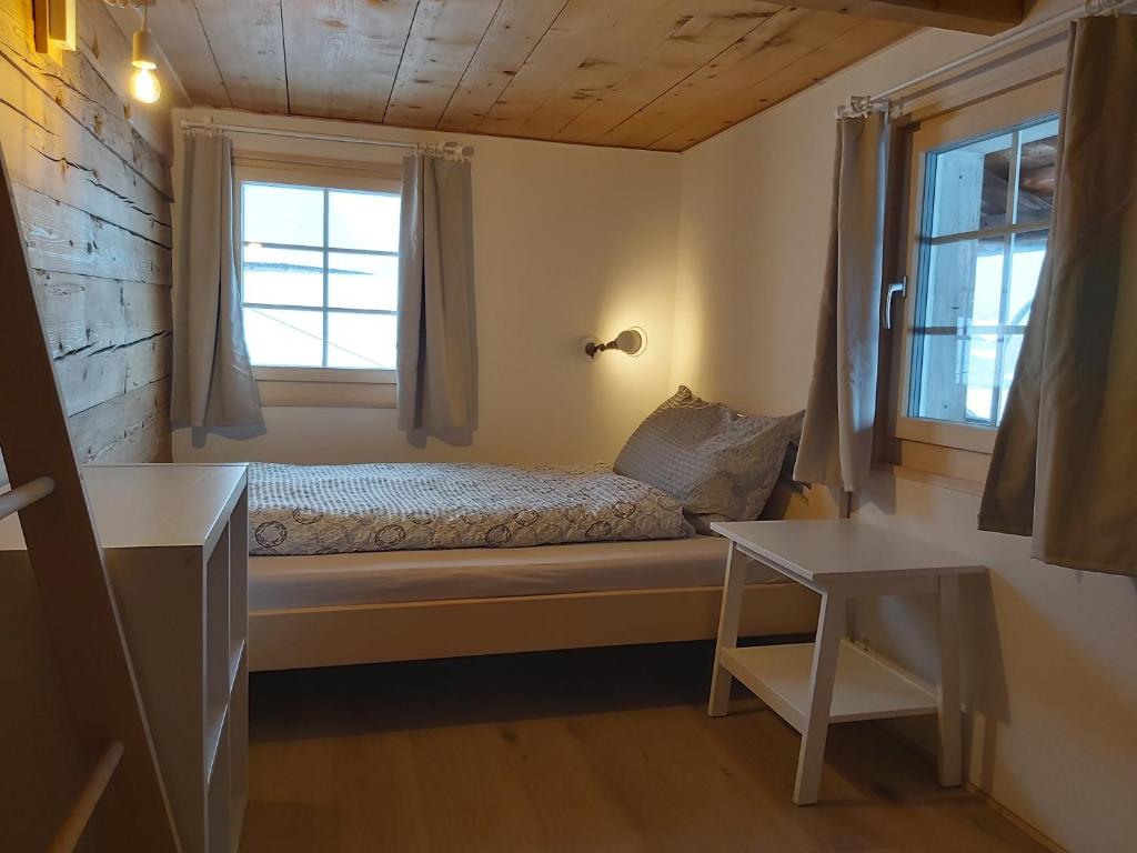 Uma cama ou camas num quarto em Tgèsa Felici