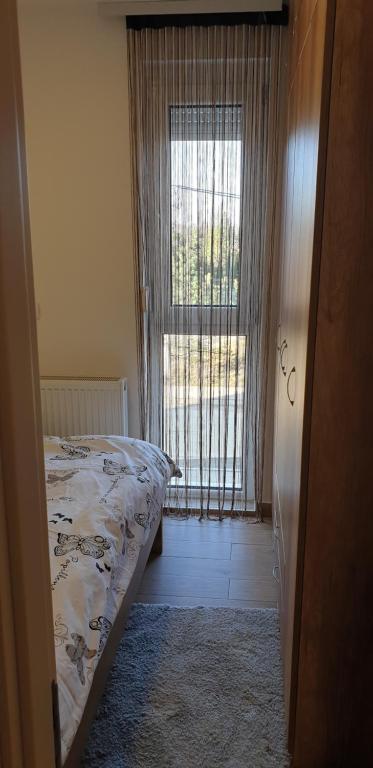 Postel nebo postele na pokoji v ubytování Apartman Mina Divcibare