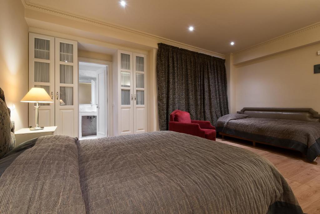 Postel nebo postele na pokoji v ubytování Lagadia Resort