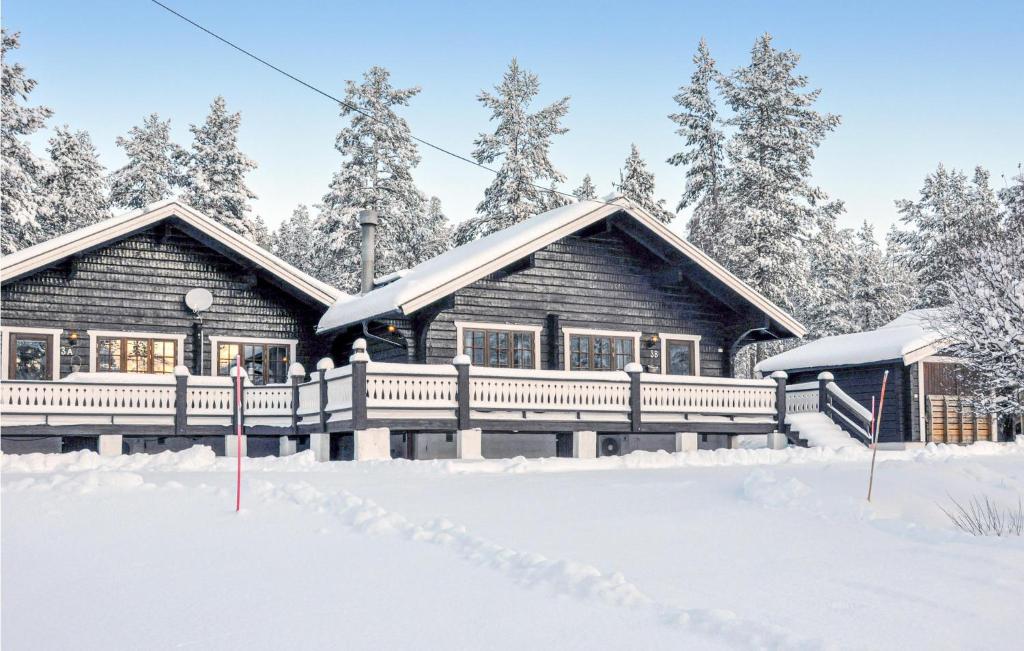 a log cabin in the snow at Amazing Home In Slen With 3 Bedrooms And Sauna in Sälen