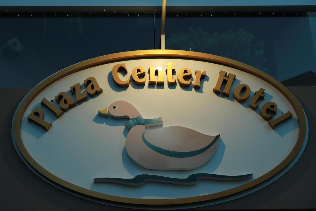 a sign for a cancer hospital with a duck on it at Plaza Center Hotel in São Lourenço do Sul