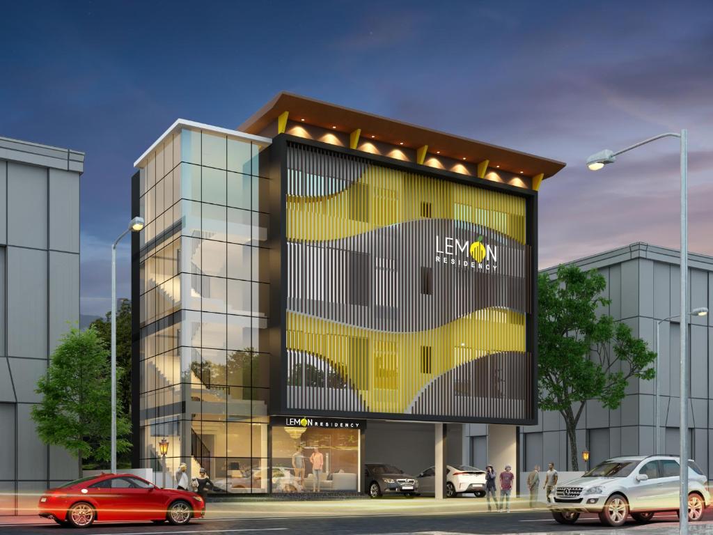 a rendering of a building with cars parked outside at LEMON RESIDENCY By Chungath in Trichūr