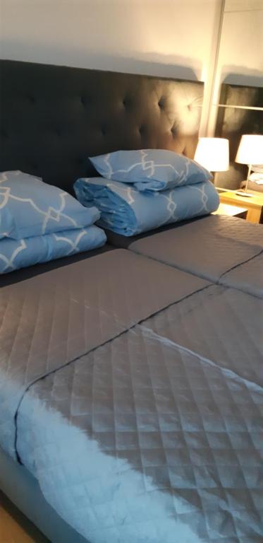 Posteľ alebo postele v izbe v ubytovaní Apartament 4 osobowy w Bel Mare