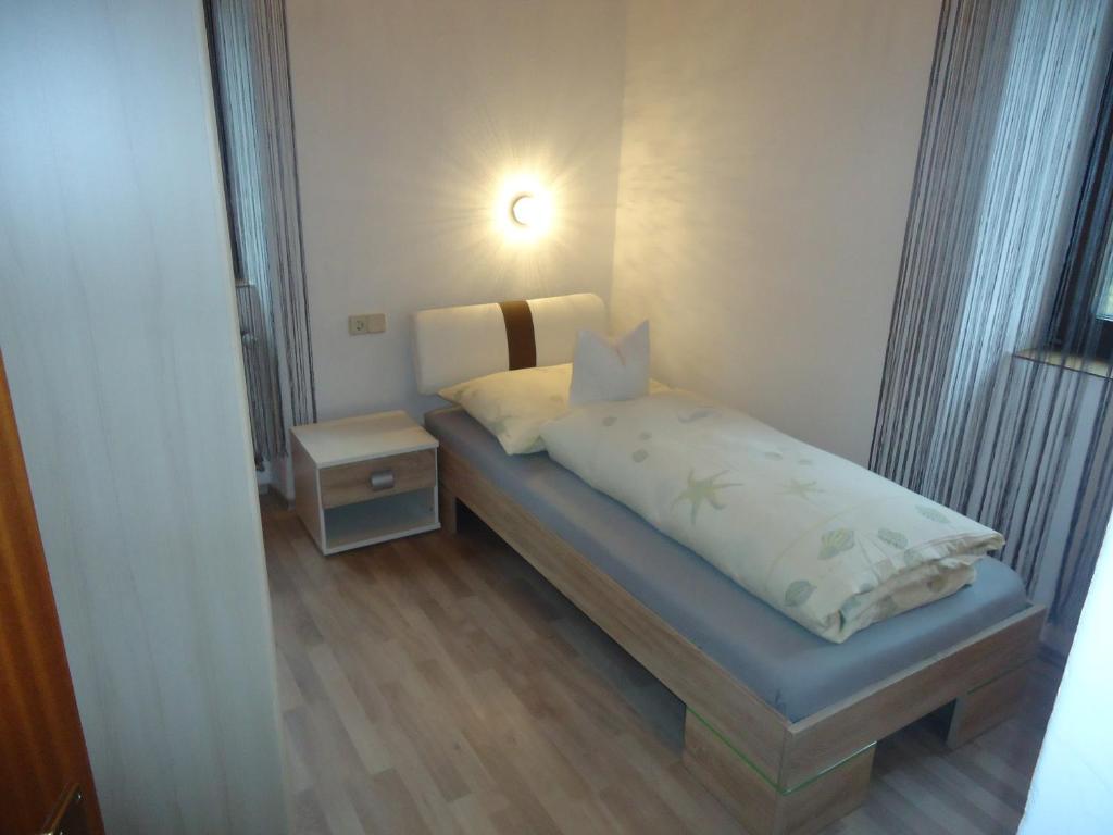 Postel nebo postele na pokoji v ubytování Haus Obernig