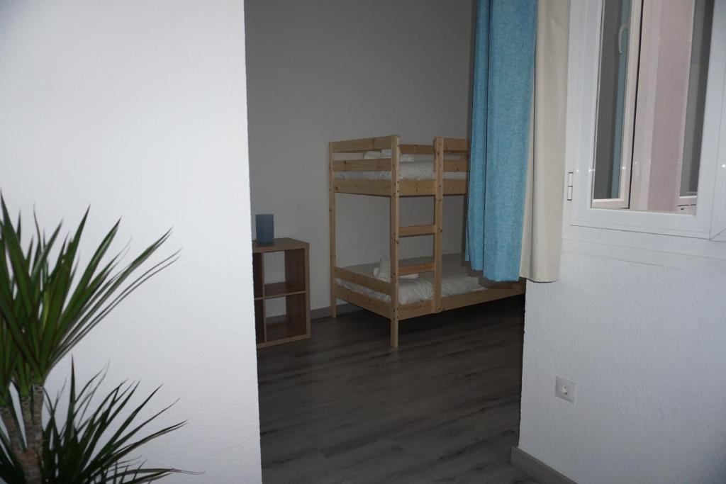 Posteľ alebo postele v izbe v ubytovaní Apartamentos Mediterránea Centro