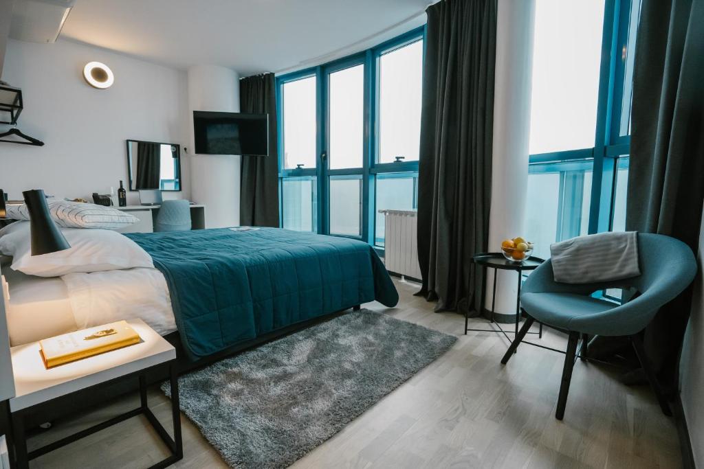 Postel nebo postele na pokoji v ubytování Hotel Blue