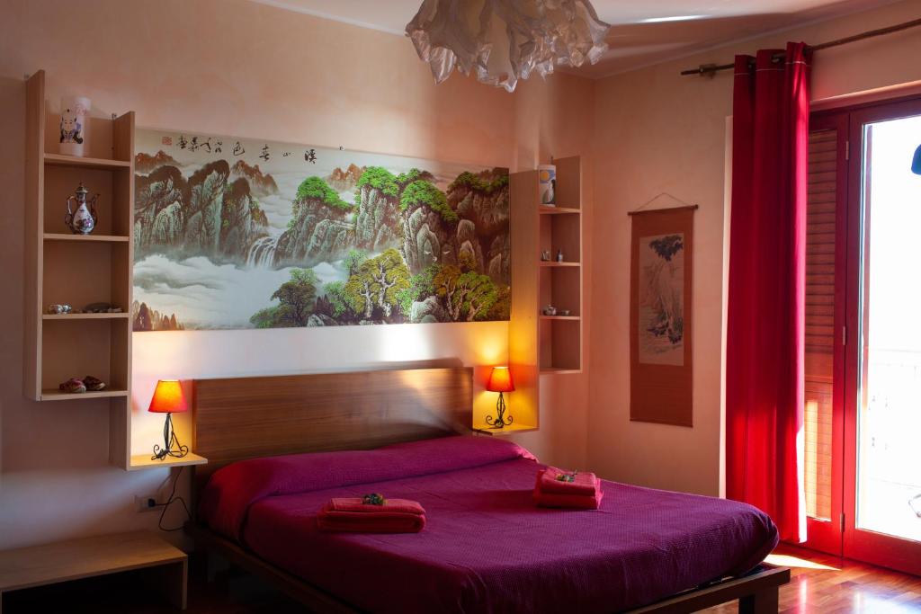 Postel nebo postele na pokoji v ubytování Felicidad Siempre B&B