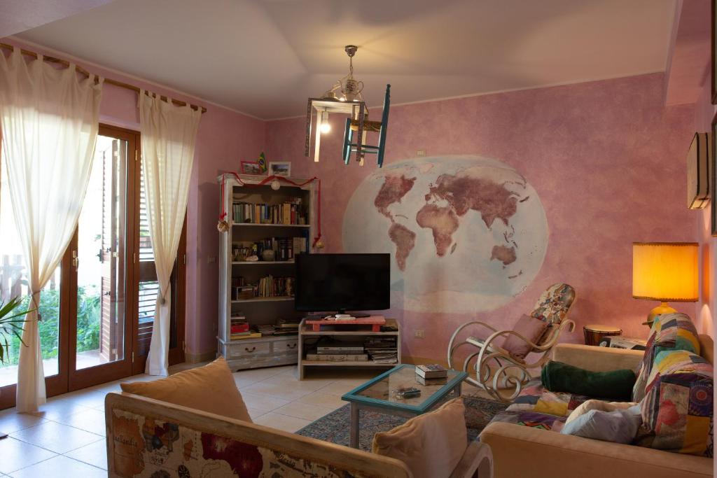 TV a/nebo společenská místnost v ubytování Felicidad Siempre B&B