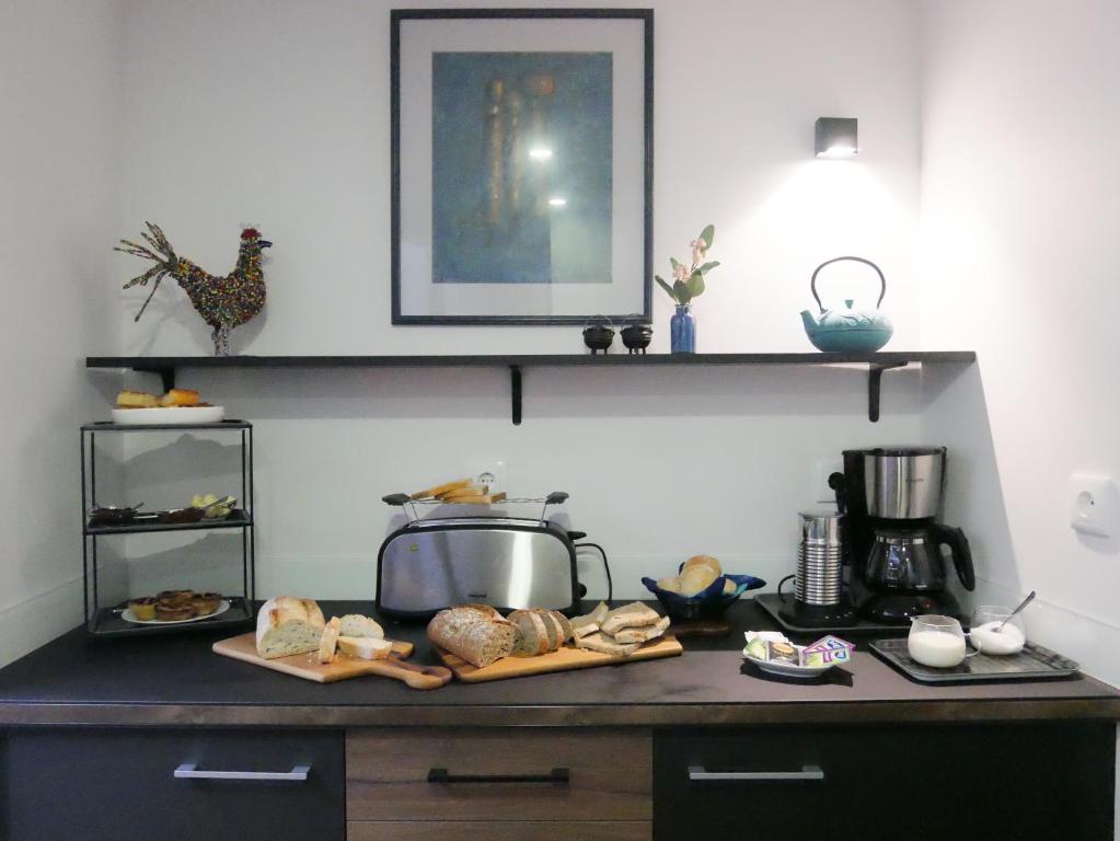 A cozinha ou cozinha compacta de Serra do Pilar Porto Suites