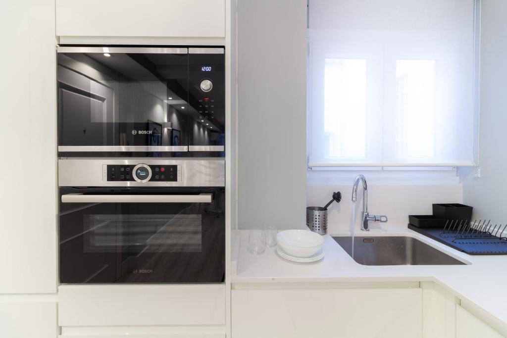 Kuchyňa alebo kuchynka v ubytovaní Xpce Malaga SOHO