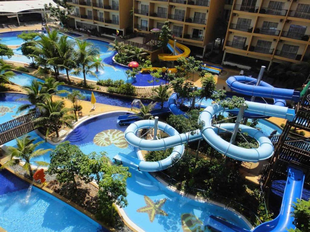 an aerial view of a water park at a resort at GOLD COAST MORIB by 369 Stay in Kampong Tanjong Pechah