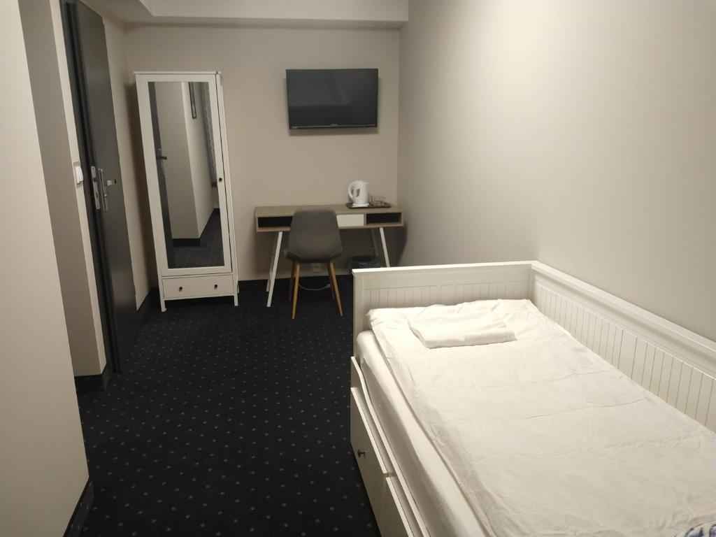 Postel nebo postele na pokoji v ubytování Cztery Kąty