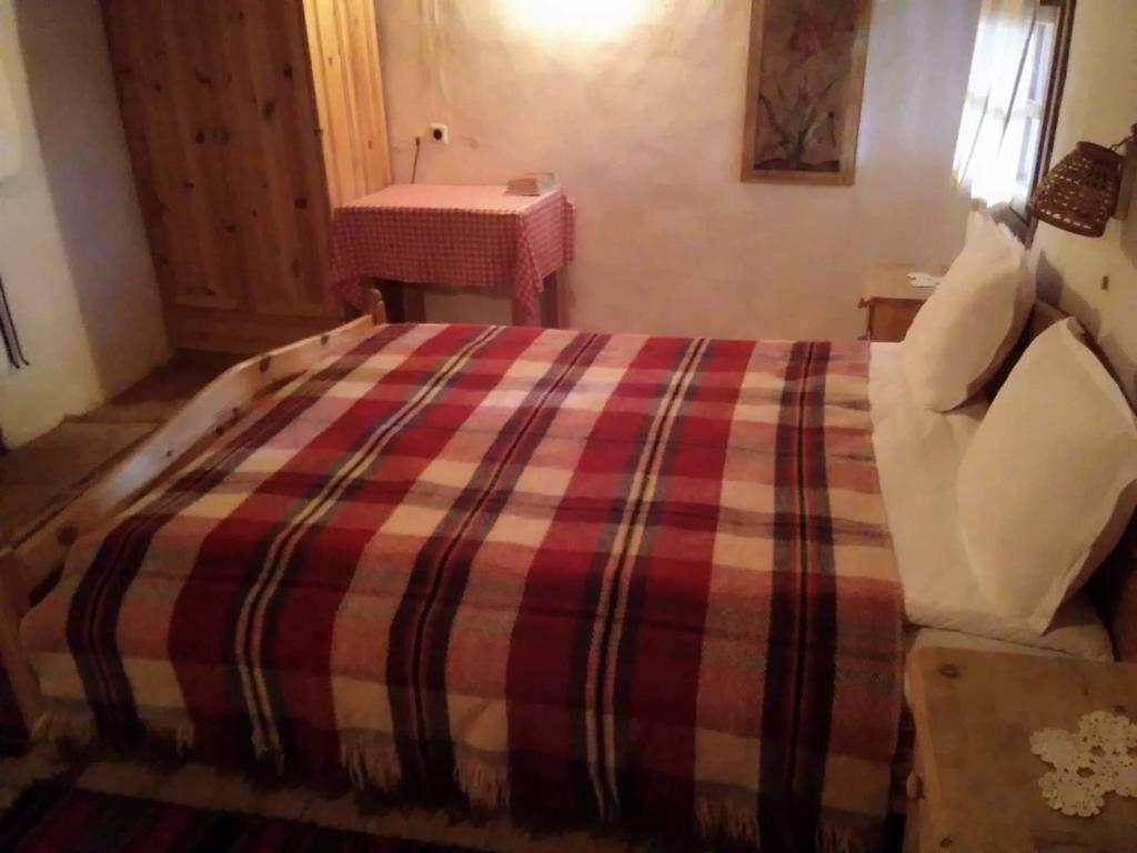 Säng eller sängar i ett rum på Leshten Eco Villas