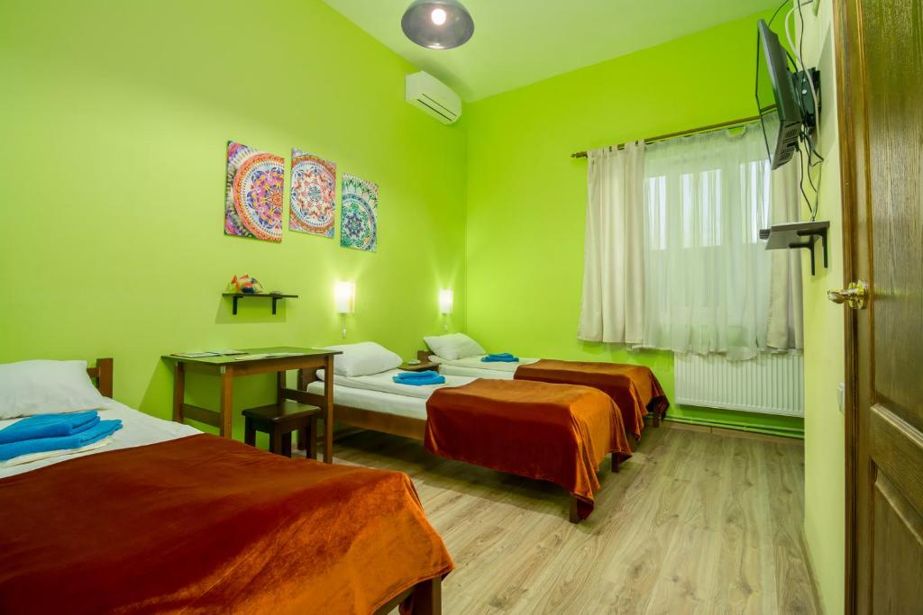 Postel nebo postele na pokoji v ubytování Mini-Hotel Ocean
