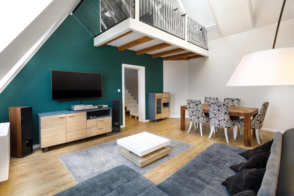 TV a/nebo společenská místnost v ubytování Apartamenty Vilda