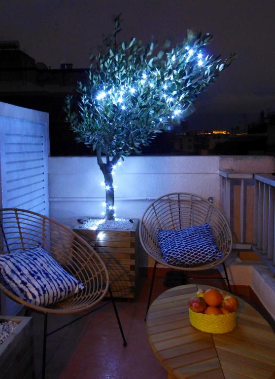 A seating area at Sophia's Penthouse Apartment With Jacuzzi and Acropolis View From Big Terrace